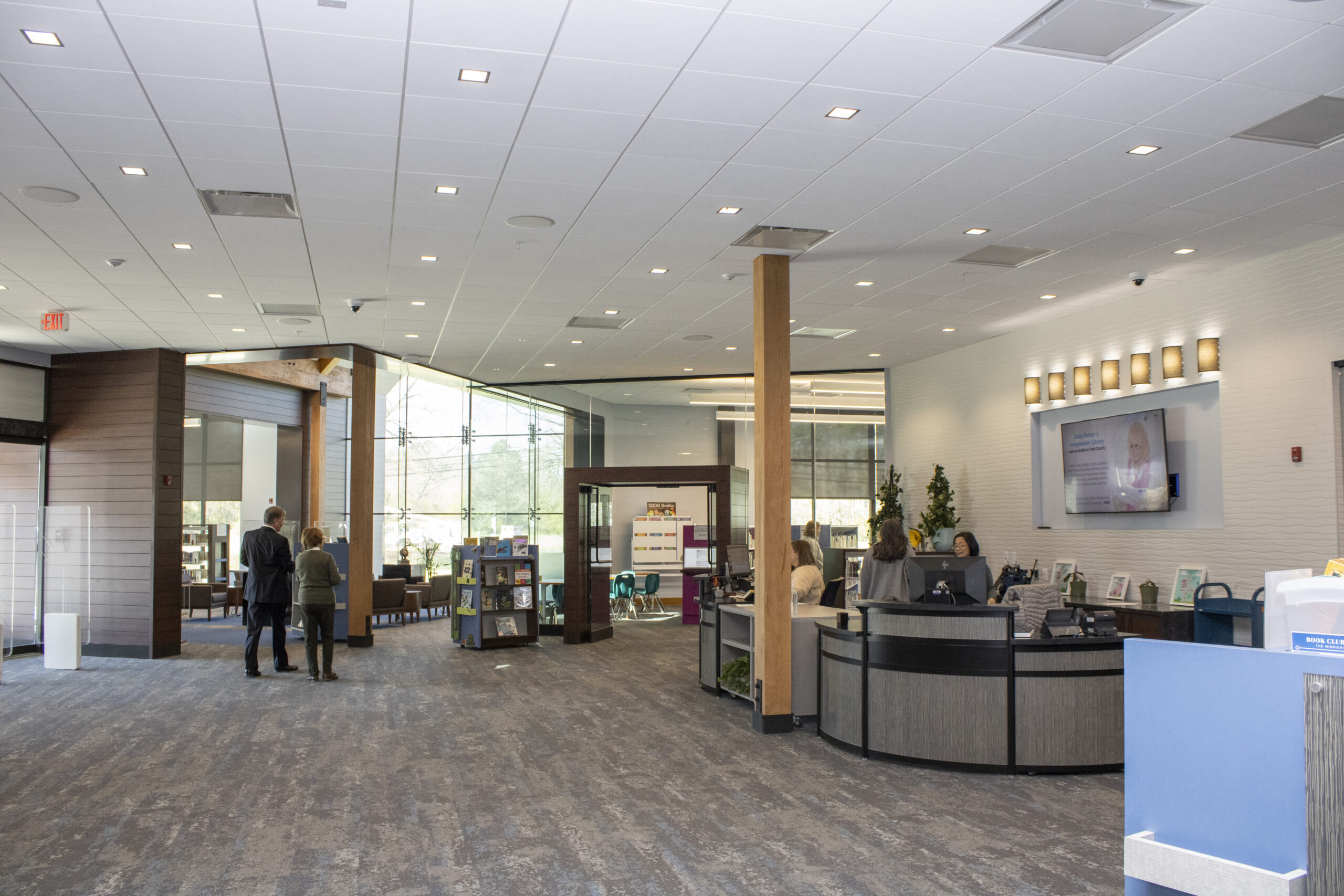 York County finances library expansion. Library main desk with children books area